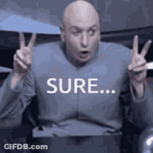 Bald Man In Blue Shirt Giving Peace Sign GIF