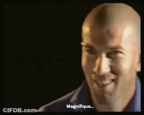 Bald Man In Blue Shirt Smiling And Talking GIF
