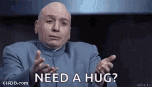 Bald Man In Blue Suit Asking For A Hug GIF