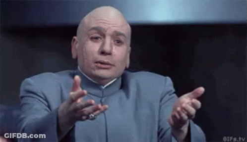 Bald Man In Blue Suit Making Funny Face GIF