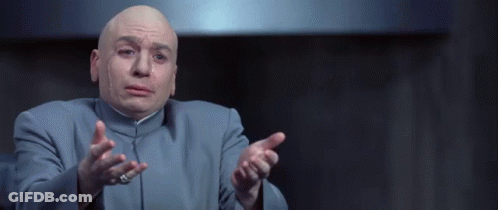 Bald Man In Blue Suit Pointing GIF