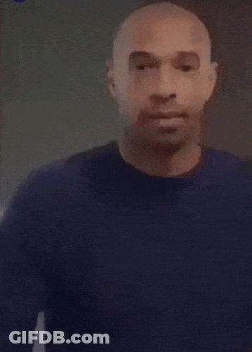 Bald Man In Blue Sweater Looking At Watch GIF