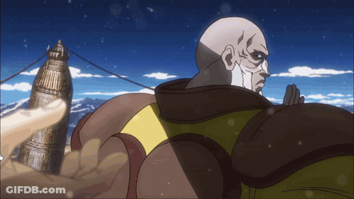 Bald Man In Brown And Yellow Outfit GIF