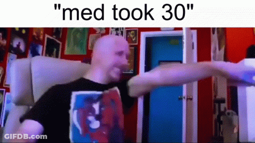 Bald Man In Front Of Red Wall Med Took 30 GIF
