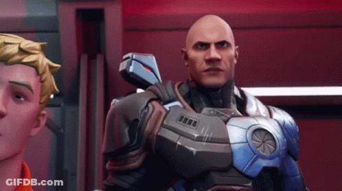 Bald Man In Futuristic Suit Next To Man In Orange Shirt GIF