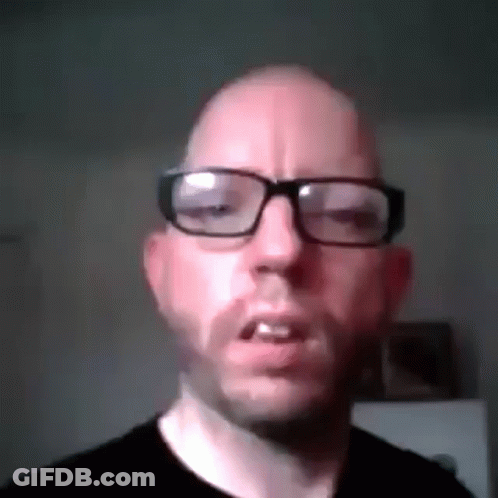 Bald Man In Glasses And Black Shirt GIF