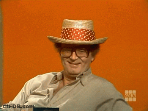 Bald Man In Glasses And Straw Hat Interviewed On CNN GIF