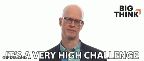 Bald Man In Glasses And Suit Says It's A Very High Challenge GIF