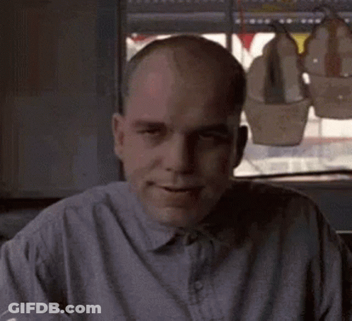 Bald Man In Gray Shirt Smiling GIF