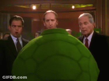 Bald Man In Green Suit Saying Hope It's As Fun As The Turtley Club GIF