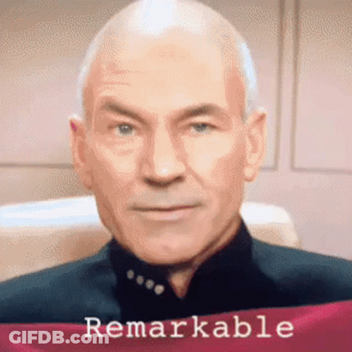 Bald Man In Green Suit Saying Professor GIF