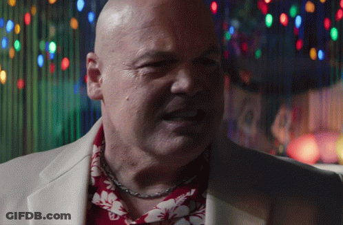 Bald Man In Hawaiian Shirt And Suit GIF