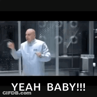 Bald Man In Lab Coat Saying Yeah Baby GIF