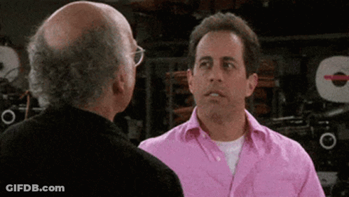 Bald Man In Pink Shirt Talking To Bald Man GIF