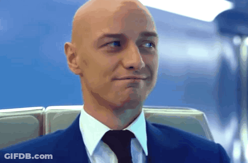 Bald Man In Purple Uniform Smiling GIF