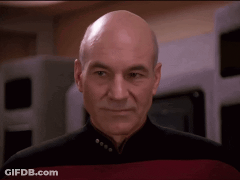 Bald Man In Red And Black Uniform GIF