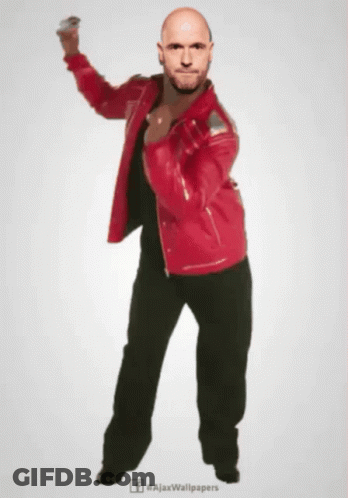 Bald Man In Red Jacket Dancing With Ajaxwallpapers GIF