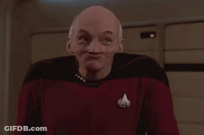 Bald Man In Red Shirt Making Funny Face GIF