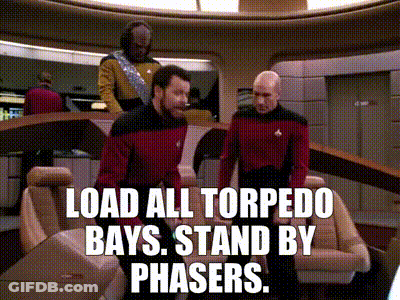 Bald Man In Red Shirt Sitting Saying Engage GIF