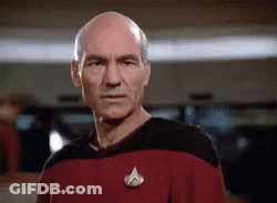 Bald Man In Red Shirt With Star Trek Pin GIF
