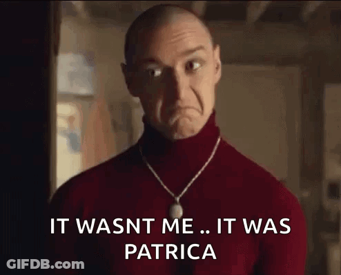 Bald Man In Red Turtleneck And Necklace Sad Face GIF