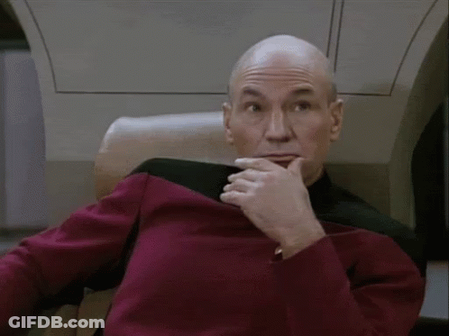 Bald Man In Red Uniform Arms Outstretched GIF