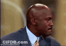 Bald Man In Suit And Tie Talking GIF