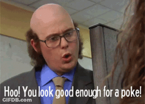 Bald Man In Suit And Tie Talking To Woman GIF