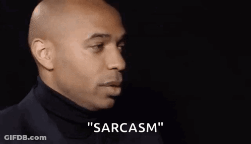 Bald Man In Suit And Turtleneck Saying Sarcasm GIF