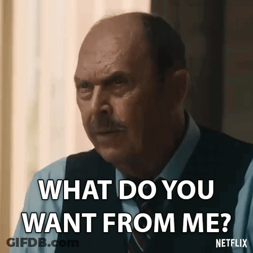 Bald Man In Suit Asking What Do You Want From Me GIF