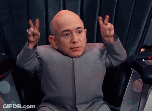 Bald Man In Suit Giving Peace Sign GIF