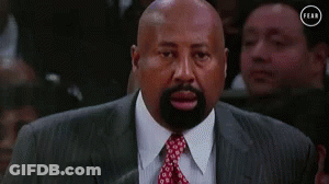 Bald Man In Suit Looking GIF