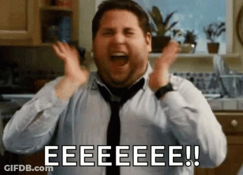 Bald Man In Suit Making Face GIF