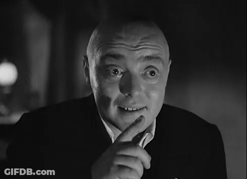 Bald Man In Suit Making Funny Face GIF