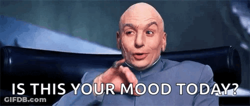 Bald Man In Suit Pointing At Camera GIF