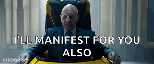 Bald Man In Suit Saying I'll Manifest For You Also GIF