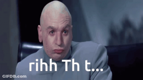 Bald Man In Suit Saying Rihhh Th T GIF