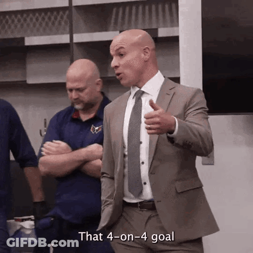 Bald Man In Suit Says That 4 On 4 Goal GIF
