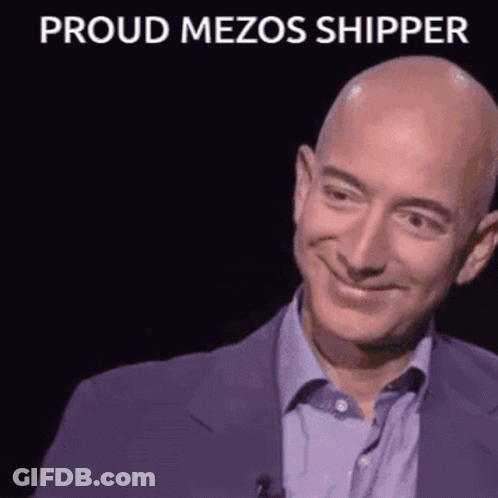 Bald Man In Suit Smiling Proud Mezos Shipper GIF