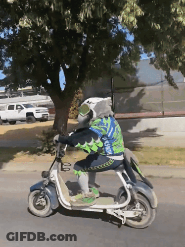 Bald Man In Suit Standing Before Stonks Chart GIF