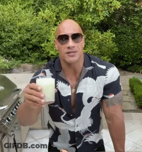 Bald Man In Sunglasses And Bird Shirt Holding Milk GIF