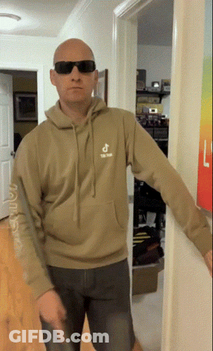 Bald Man In Sunglasses And TikTok Hoodie GIF