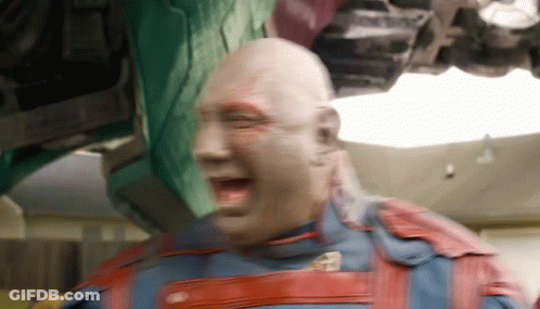 Bald Man In Superhero Costume Laughing GIF