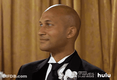 Bald Man In Tuxedo With Hulu Logo GIF
