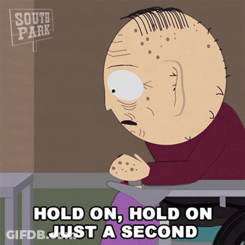 Bald Man In Wheelchair Hold On Just A Second GIF