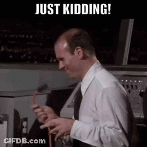 Bald Man In White Shirt Holding Hose And Smiling GIF