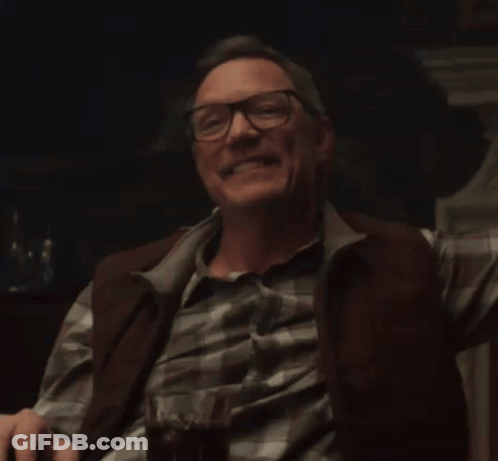 Bald Man In White Suit And Tie GIF