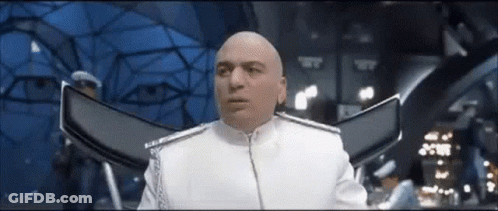 Bald Man In White Uniform Blue Background GIF