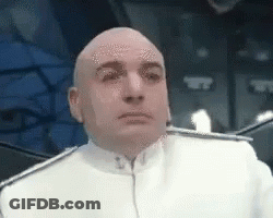 Bald Man In White Uniform Sitting GIF