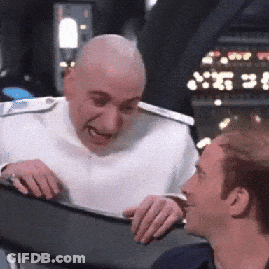 Bald Man In White Uniform Talking To Man GIF
